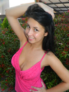 Delicious black teenie with a sweet delicate body posing naked on bed