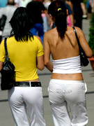 Upskirts views of a plenty of young maidens walking along city streets