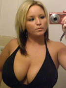 Ebony diva in her red lingerie likes to play with her big juicy tits