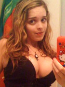 Hot skank shows her busty breasts and that's what you call hot.