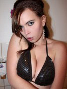 Adorable young hottie with unbelievable big boobs wants you watch her gettin naked.