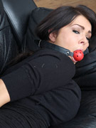 Restrained young babe receives a firm punishment and used as a sex slave.