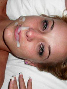 Whore drinks cum out of a condom
