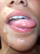 Black slutty teen gets mouthful of sweet man's juice after hot banging