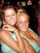 Wild party girls getting horny and starting to kiss each other