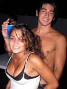 Hot teen babes with really big tits revealing them during a wild party