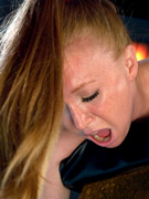 Lovely red-head gets tied up and machine fucked.