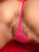 Black slut with bush sucks and fucks black dick