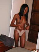 Merry ponytailed mom drinking champagne naked on her bed