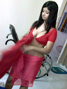 Indian milf with glasses squeezes huge tits
