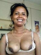 Young indian girl with small tits spreading pussy