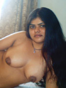 Amateur indian hottie revealing her gorgeous body of tight clothes and teasing on a cam.