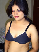Busty indian arhuarya lifts up her red sari to show off her hairy hole