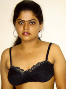 Divya is sexy black camisole rubbing her shaved pussy
