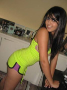 Gianna gets comfortable on the couch and strips down