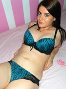 Chubby performer fucks her pussy with a stiff dildo on red live sex chat room