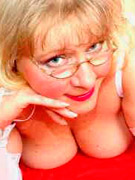 Skanky cougar rides up and down on a throbbing dick