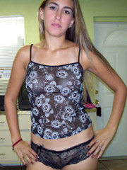 Stunning teen beauty in sexy jeans and lingerie stripteasing and flashing her boobies.