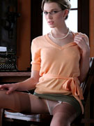 Hot brunette in high heels demonstrates her delights in the office