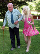Slim girl opening her box for the graying man enjoying his tongue and boner