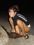 Girl takes her tiny thongs off and pisses outdoors