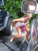 Girl helping to the  other to piss bending body.