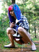 Exciting blonde cutie goes into bushes for a piss