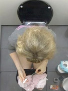 Chubby catwoman pissing on her masked female slave