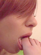 Scarlett licking her toes