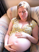 Curly blonde preggo sucks two creamy cocks, gets dped and takes jewelry right in a gym