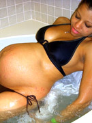 Curvaceous pregnant brunette in sexy bikini pleasing hersels outdoors. tags: masturbating, perky boobs, shaved pussy