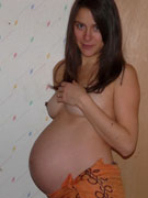Brunette pregnant beauty slowly slips out her ruffled lingerie and masturbates. tags: shaved vagina, small boobs.
