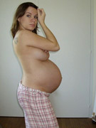 Busty redhead pregnant bibmo in sexy lingerie going lesbo with her friend in white stockings.