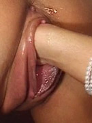 Horny milf fondles herself while her cunt gets suctioned