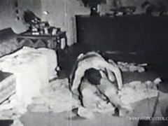 Sexy shaper retro chick giving an awesome head to lucky dude on the sofa.