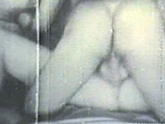 Two retro guys releasing their boner on a hairy retro girl