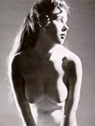Two hairy seventies ladies playing with dick and a strapon